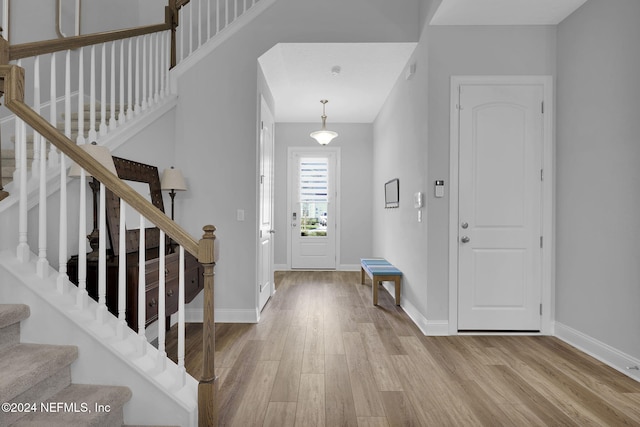 entrance foyer featuring light hardwood / wood-style floors