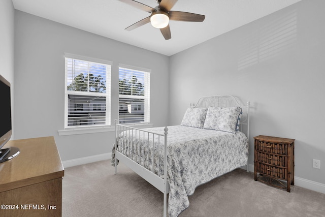 bedroom with carpet floors and ceiling fan