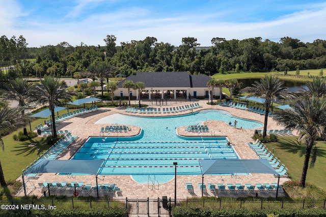 view of swimming pool featuring a patio