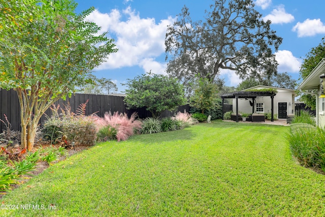 view of yard featuring a gazebo and a patio area