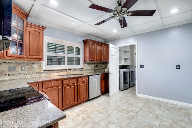 kitchen featuring tasteful backsplash, sink, dishwasher, washing machine and clothes dryer, and ceiling fan