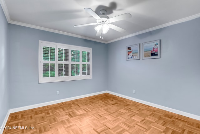 empty room with ornamental molding, light parquet flooring, and ceiling fan