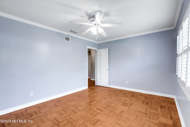 unfurnished room featuring crown molding, light parquet flooring, and ceiling fan