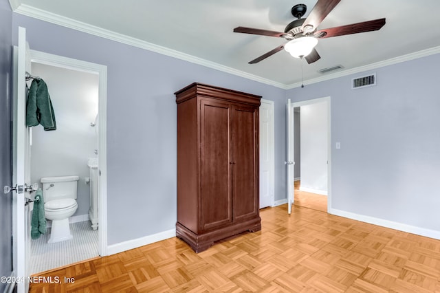 unfurnished bedroom featuring ornamental molding, ensuite bathroom, light parquet floors, and ceiling fan