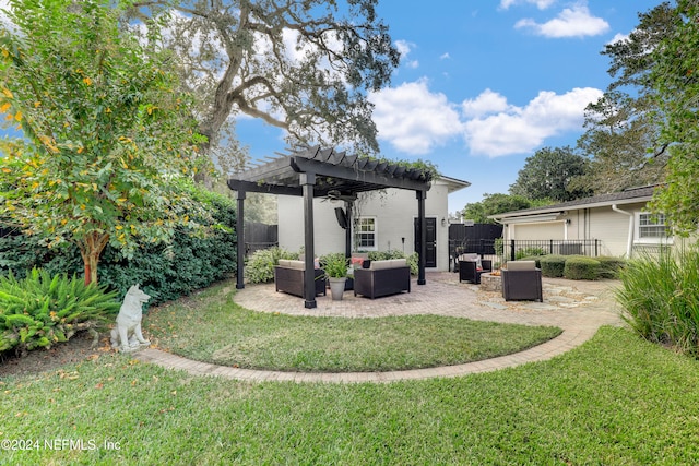 view of yard featuring a pergola, a patio area, and an outdoor living space