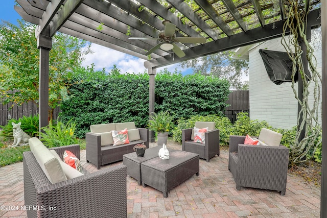 view of patio / terrace featuring outdoor lounge area, ceiling fan, and a pergola