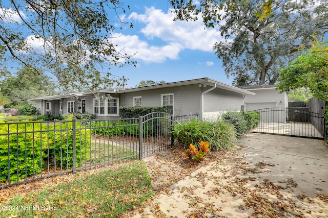 view of front of property with a garage