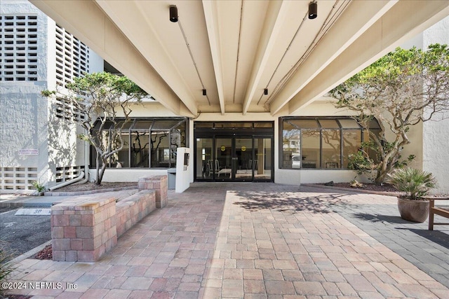 property entrance with a patio