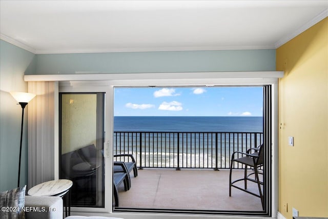 balcony with a beach view and a water view