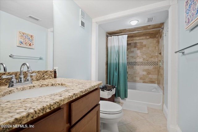 full bathroom featuring tile patterned flooring, vanity, toilet, and shower / bathtub combination with curtain