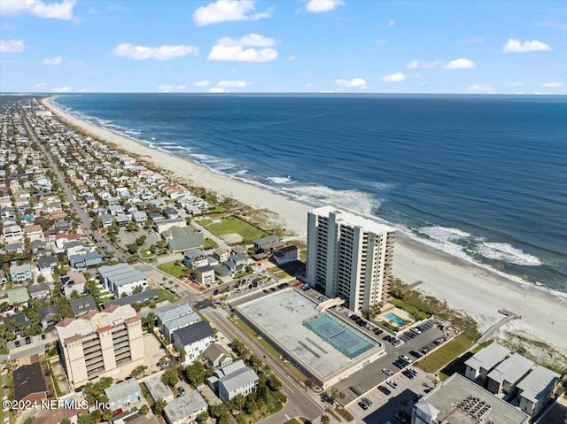 aerial view featuring a view of the beach and a water view