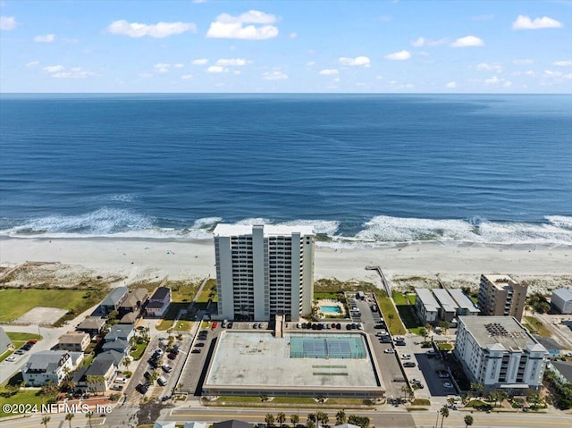 bird's eye view featuring a beach view and a water view