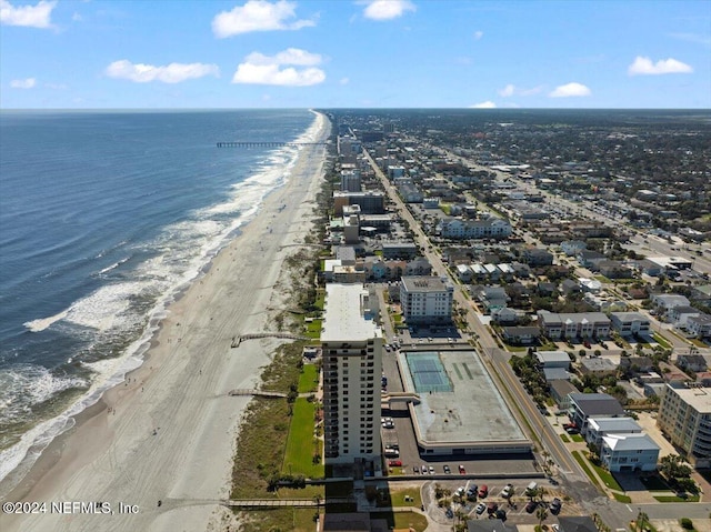 aerial view featuring a water view and a beach view