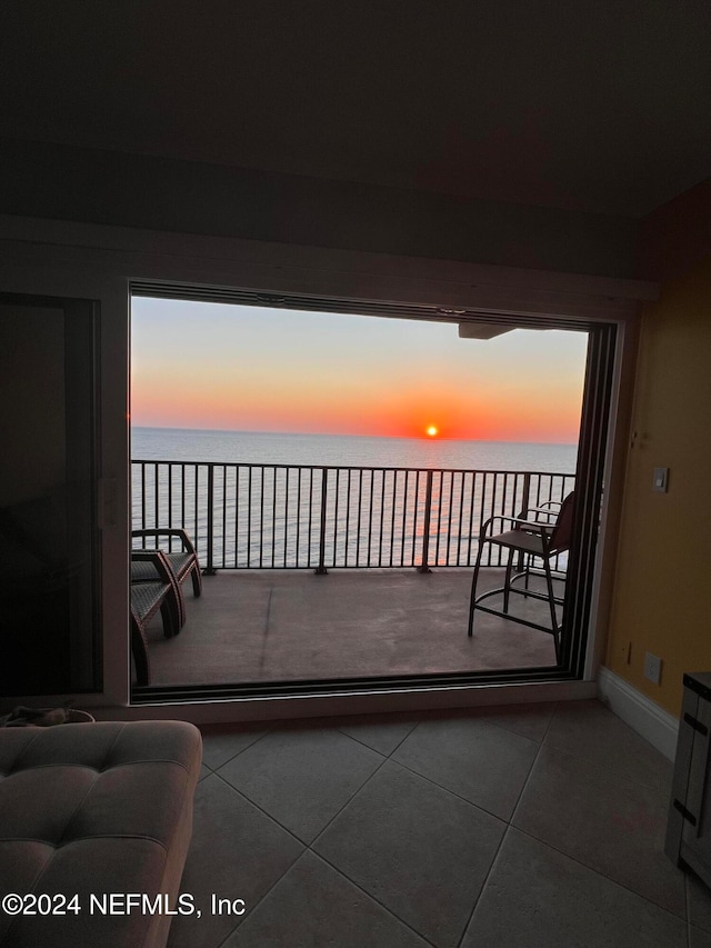 balcony at dusk with a water view