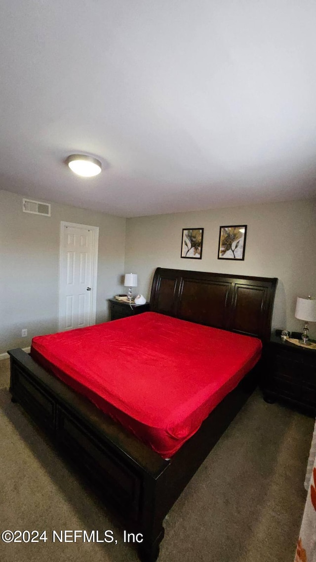 bedroom featuring carpet flooring