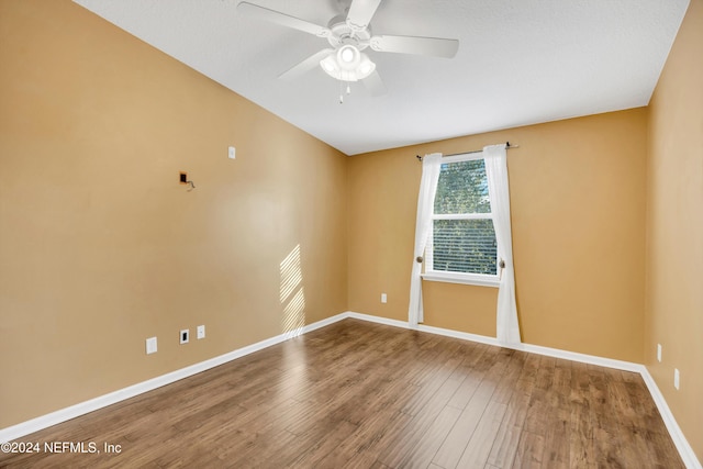 unfurnished room featuring wood-type flooring and ceiling fan