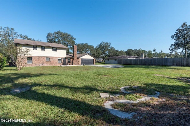 view of yard with a garage