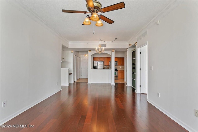 unfurnished living room featuring ornamental molding, a textured ceiling, and dark hardwood / wood-style floors