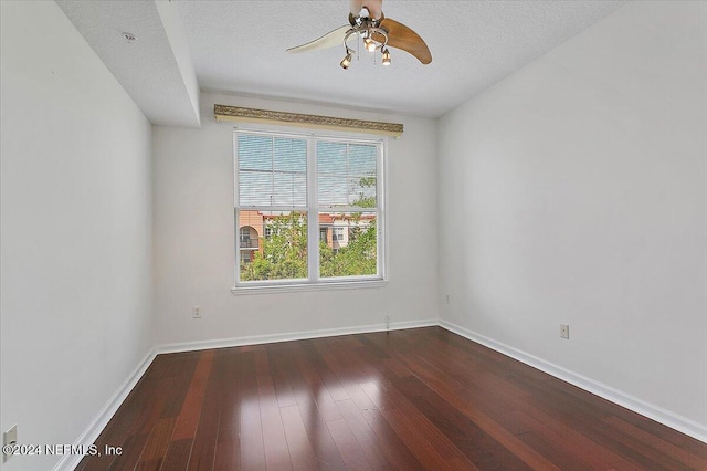 unfurnished room featuring a textured ceiling, hardwood / wood-style floors, and ceiling fan