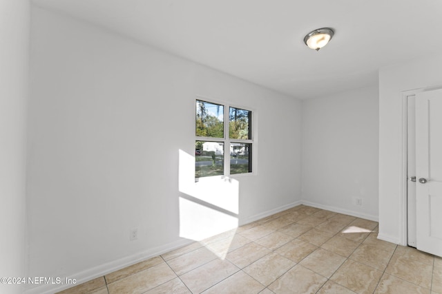 view of tiled spare room