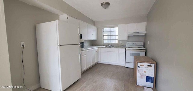 1657 Union St W, Jacksonville, FL 32209 - kitchen with sink, white cabinets, white appliances, and light hardwood / wood-style floors