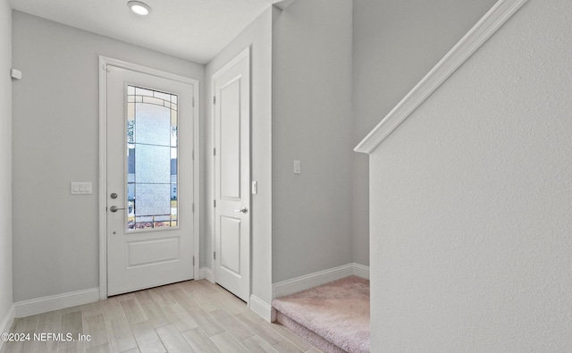 entrance foyer with light hardwood / wood-style flooring