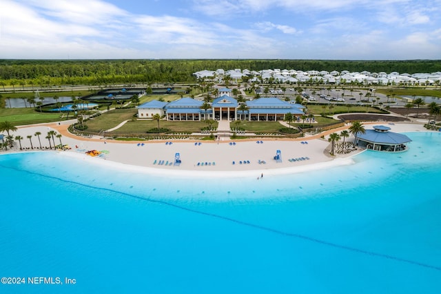 drone / aerial view with a view of the beach and a water view