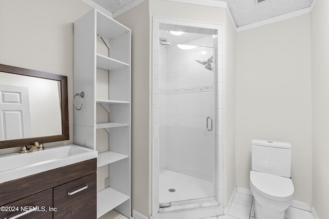 bathroom with toilet, a shower stall, baseboards, and vanity