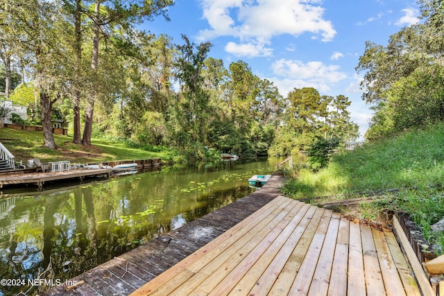 view of dock with a water view