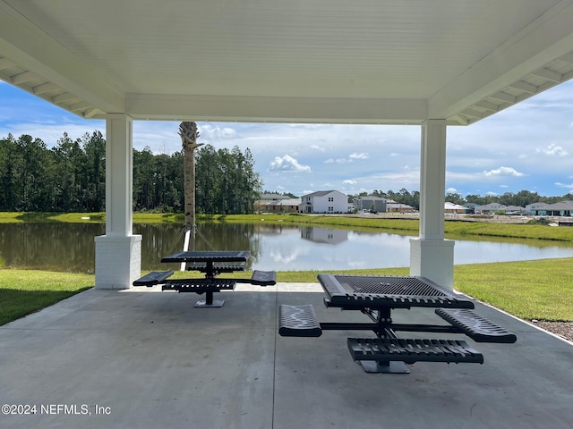 view of patio / terrace with a water view