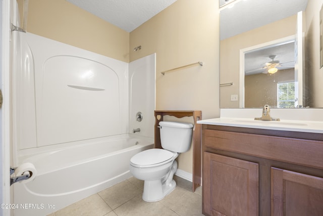 full bathroom with tile patterned flooring, ceiling fan, toilet, a textured ceiling, and tub / shower combination