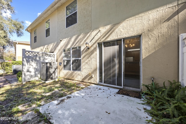 rear view of property featuring a patio area