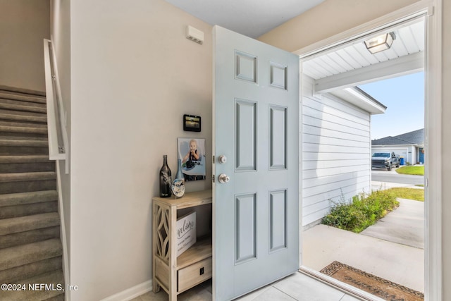 view of tiled foyer entrance