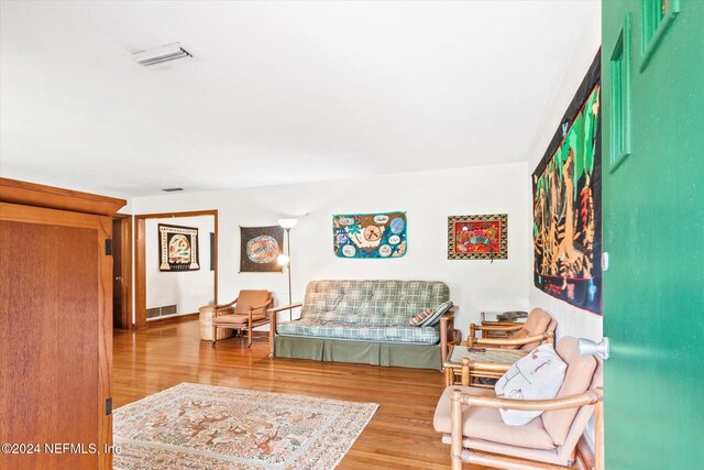 living room with hardwood / wood-style flooring