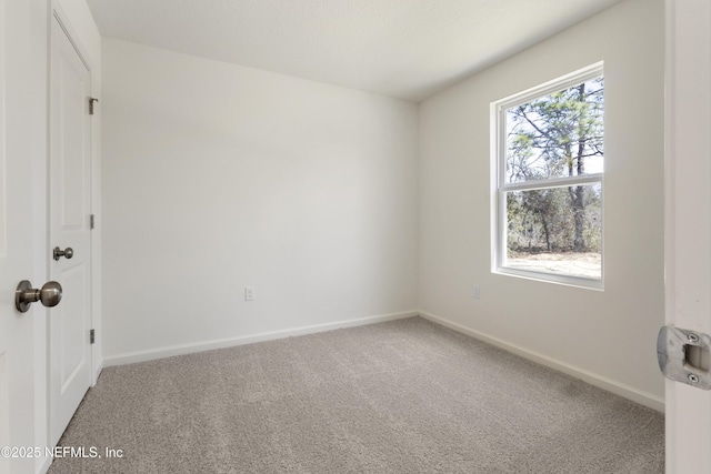 744 Hunter Rd, Hollister, FL 32177 - spare room with carpet floors and baseboards