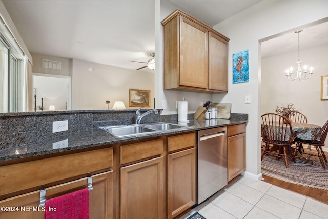 8757 Little Swift Cir Unit 22F, Jacksonville, FL 32256 - kitchen featuring stainless steel dishwasher, a sink, light tile patterned floors, brown cabinetry, and a ceiling fan