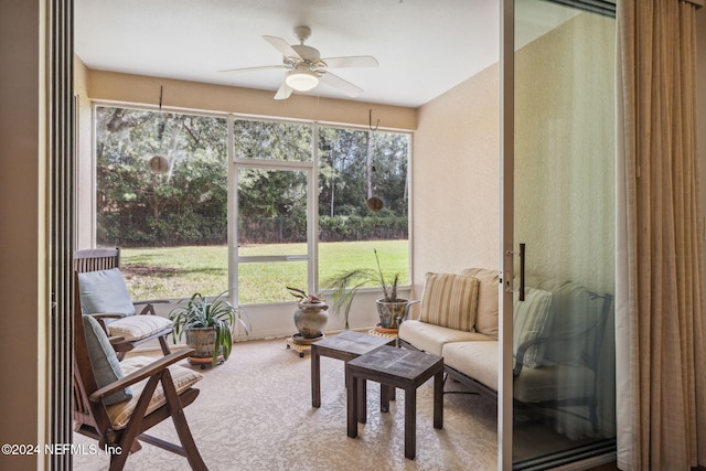 sunroom / solarium with ceiling fan