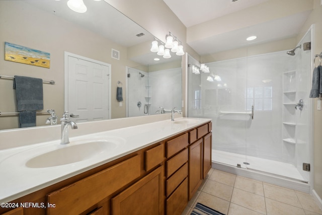 8757 Little Swift Cir Unit 22F, Jacksonville, FL 32256 - bathroom with a stall shower, double vanity, and tile patterned flooring