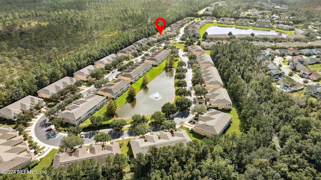 8757 Little Swift Cir Unit 22F, Jacksonville, FL 32256 - aerial overview of property's location with nearby suburban area, a large body of water, and a heavily wooded area