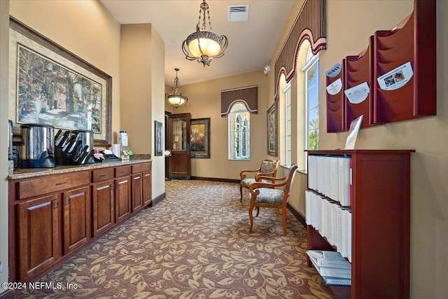 8757 Little Swift Cir Unit 22F, Jacksonville, FL 32256 - corridor featuring carpet floors and baseboards
