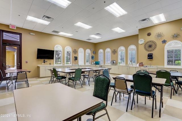 8757 Little Swift Cir Unit 22F, Jacksonville, FL 32256 - dining area featuring a drop ceiling and light flooring