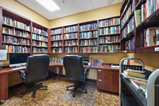 8757 Little Swift Cir Unit 22F, Jacksonville, FL 32256 - home office featuring wall of books and a drop ceiling