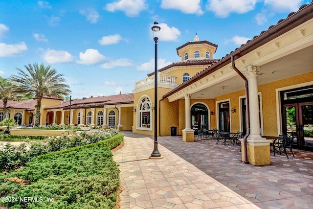 rear view of house featuring a patio area