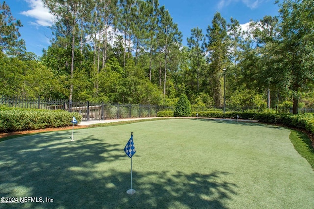 view of property's community with fence