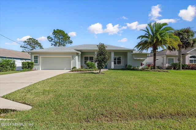 ranch-style home featuring a front yard and a garage