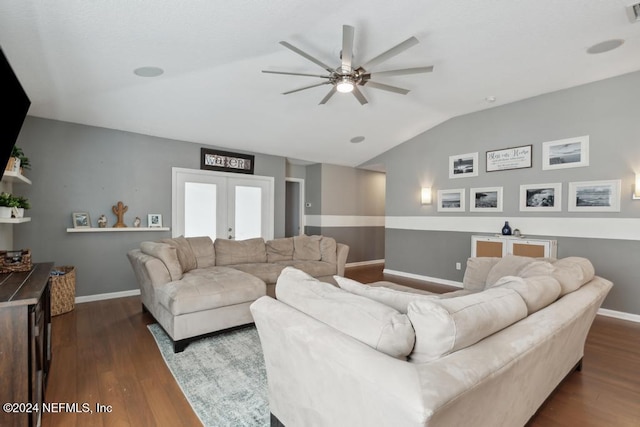 living room featuring hardwood / wood-style floors, vaulted ceiling, ceiling fan, and french doors