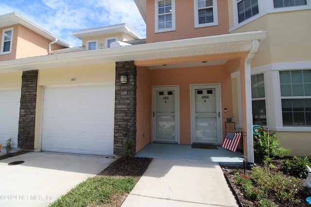 entrance to property with a garage