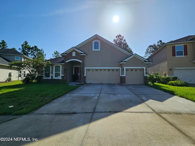 front facade with a front lawn