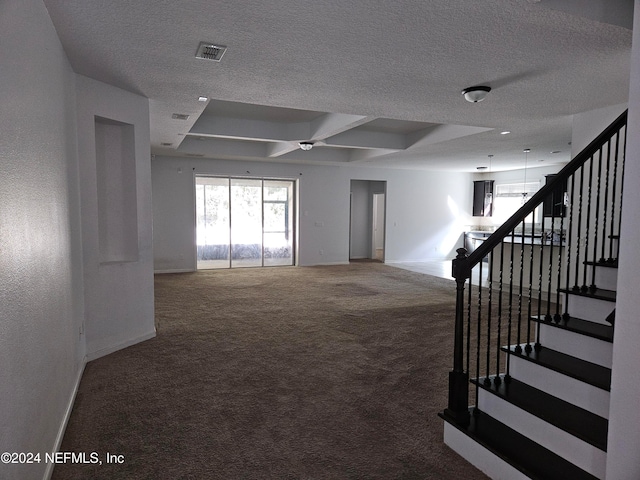 interior space with a textured ceiling