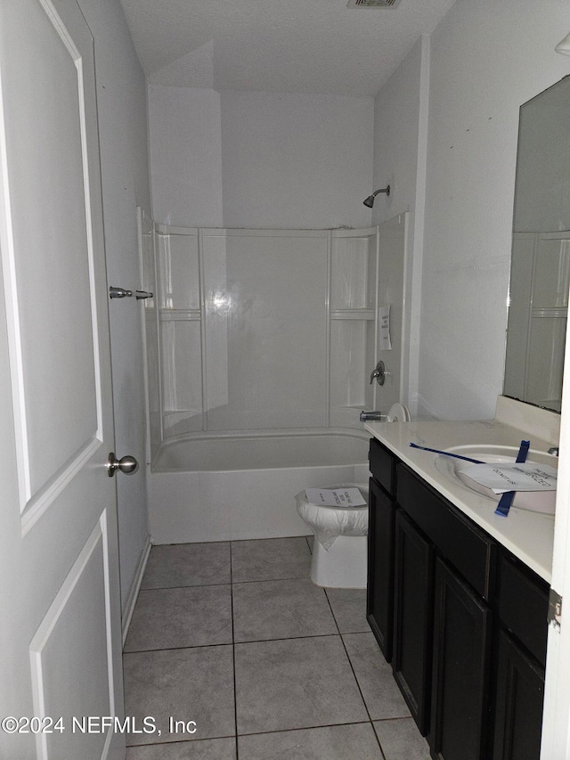 full bathroom with vanity, shower / bathing tub combination, tile patterned floors, and toilet